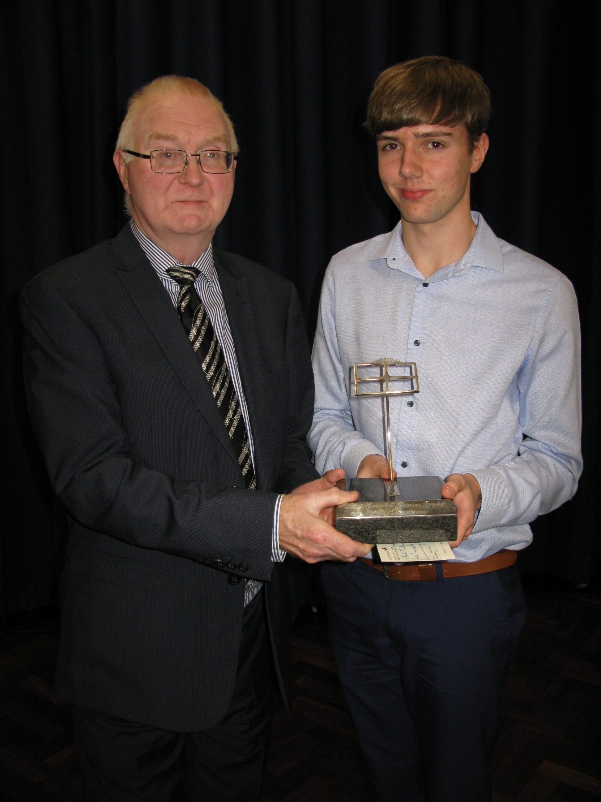 Jack with Chris Howarth presenting the trophy